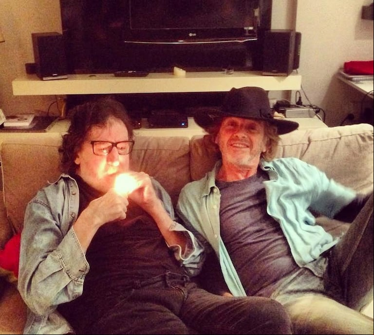 Porchetto junto a Charly García, uno de sus grandes amigos del rock.